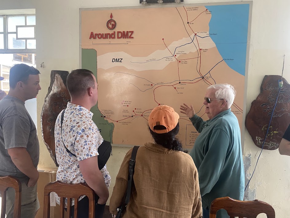 Students around a map of the DMZ.